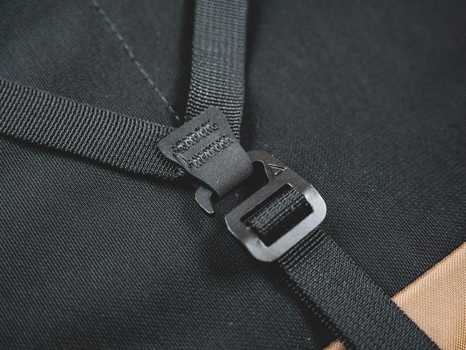 silver belt buckle on black textile